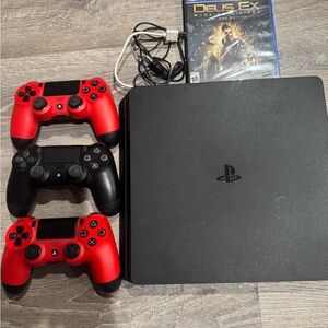 Sony PlayStation 4 Console with Red and Black Controllers
